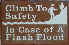 Climb To Safety Flash Flood Sign