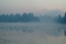 Lake with early morning mist