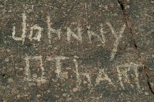 Graffiti at Red Canyon Petroglyphs